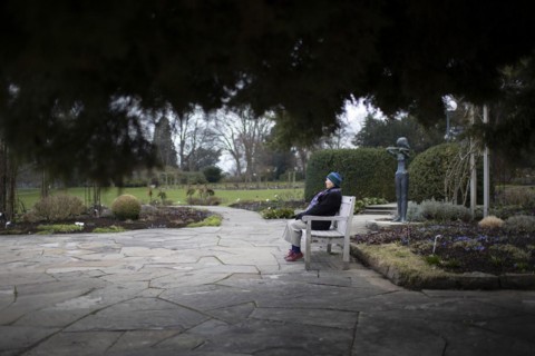 Subject: Pensioner on a park bench in Westfalenpark in Dortmund