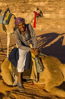 Friendly Bedouin with his camels