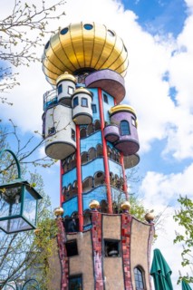 Kuchlbauer Tower by architect Friedensreich Hundertwasser in the blue sky