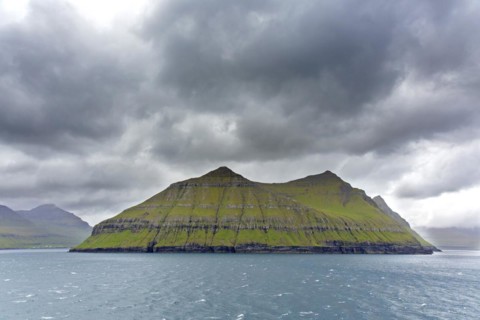 Sea cliffs along the rugged coast of Eysturoy