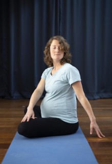 Pregnant woman doing yoga