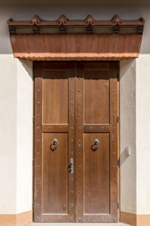 Entrance door with reconstructed lintel