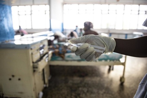 Nurse holding syringes at Princess Christian Hospital in Sierra Leone