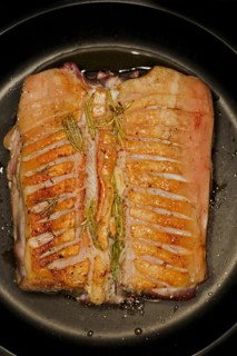 Sliced and seared rack of lamb with rosemary