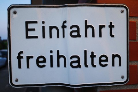 Sign with inscription Keep driveway clear
