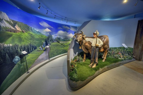 Painted landscape panorama with cow and guardian boy