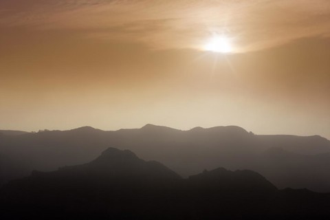 Sunset behind clouds