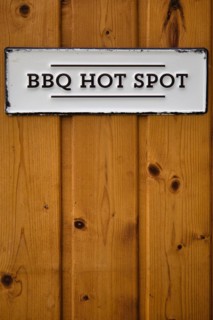 Sign with inscription BBQ Hot Spot