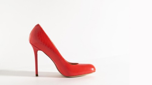 Bright red shoes on the white background