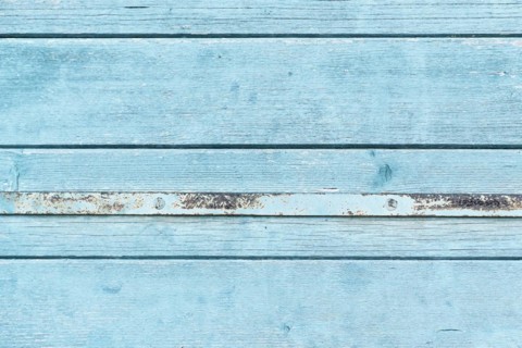 Light blue wooden background with horizontal old planks