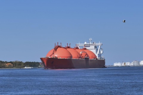 LNG or liquified natural gas tanker entering port on a sunny day in Klaipeda