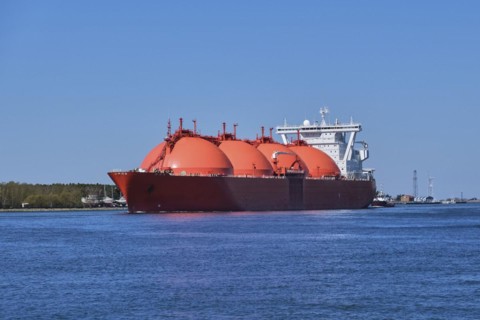 LNG or liquified natural gas tanker entering port on a sunny day in Klaipeda