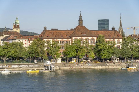 Theobald Baerwart Schoolhouse in Kleinbasel and the Rhine in Basel