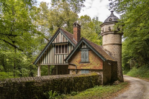 Buillon Castle in Chenecey-Buillon and the River Loue
