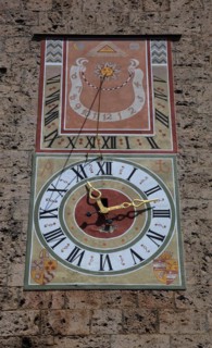 Sundial and modern tower clock