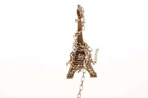 Eiffel Tower model made of metal in chains