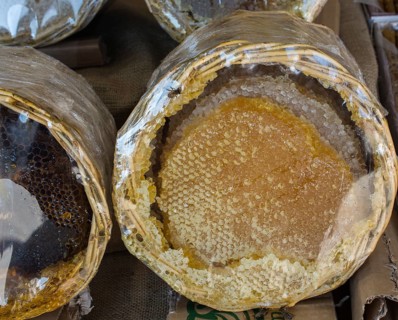 Sweet fresh honey in the sealed comb frame