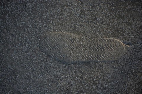 Footstep pattern seen on a concrete background