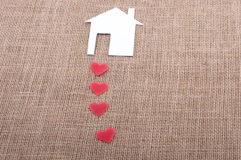 Model house and a heart shape beside it