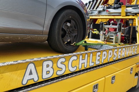Writing towing service on tow truck