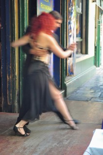 A couple dances tango in public for tourists in La Boca