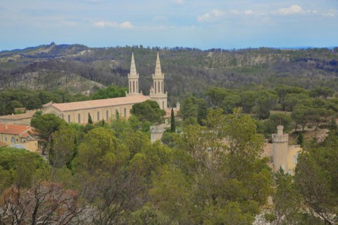 View of Romanesque monastery Saint-Michel-de-Frigolet with Saint-Dame-du-Bon-Remède church in the Alpilles