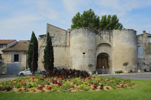 Historic city gate Porte de la Condamine with two towers