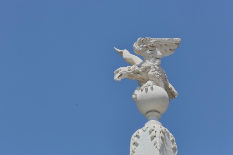 White eagle figure at the ornamental fountain Fontaine des Prêcheurs