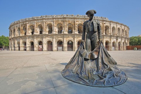 Torero sculpture in front of the Roman amphitheatre