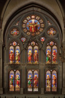Stained glass window of the neo-Gothic St Baudile Church