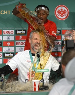 Beer shower during press conference PK for coach Coach Marco Rose by Mohamed Simakan