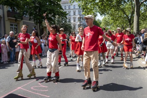 A participating group of rollerbladers give a warmly-received performance to entertain the crowd before the start of the Carnival of Cultures