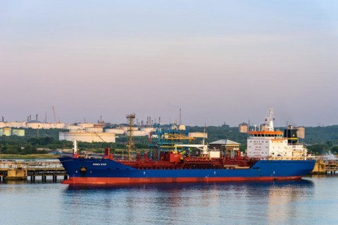 Sunrise over Gas tankers and Esso Oil Terminal