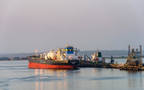 Sunrise over Gas tankers and Esso Oil Terminal