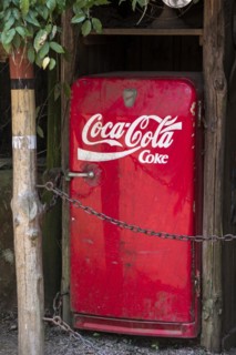 Old red vintage Coca Cola Frigidaire refrigerator