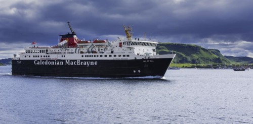 Isle of Mull ferry boat from Caledonian MacBrayne leaving the Oban port and sailing to Craignure