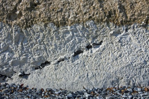 Chalk cliff showing layers of flint rock in Jasmund National Park on Rugen Island on the Baltic Sea