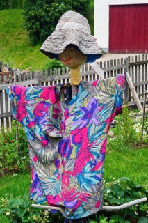 Scarecrow with colourful shirt