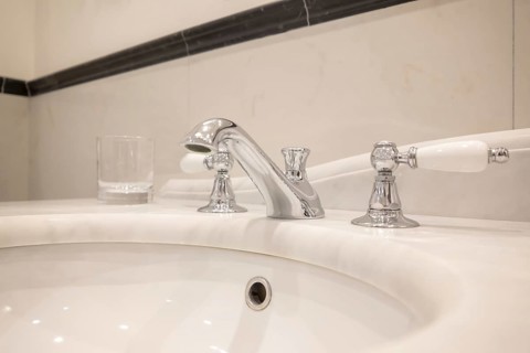 Retro Style Chrome Faucet in Bathroom in France