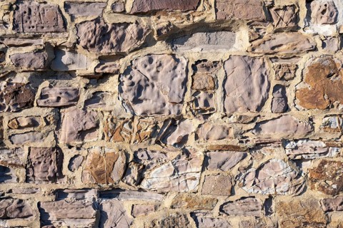 Wall stones of different types of stone
