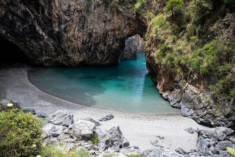 Beautiful hidden beach. The Saraceno Grotto is located directly on the sea in Salerno