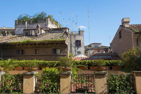 TV Antennas on the Roofs of the Old Town of Rome in a Sunny Day in Lazio