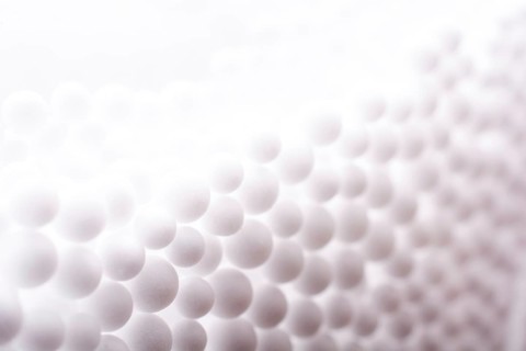 White little polystyrene foam balls as background