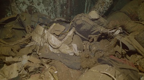 Passengers luggage and personal belongings lie inside hold of ferry Salem Express shipwreck