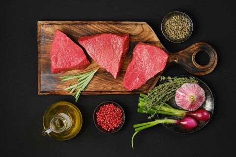 Top view of raw strip steak boneless