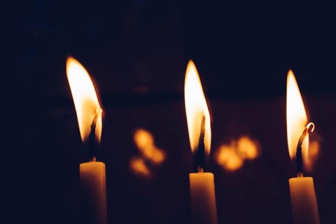 Burning candle making light in view