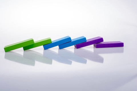 Colorful Domino Blocks placed on a white background