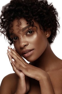 African American skincare models with perfect skin and curly hair. Beauty spa treatment concept
