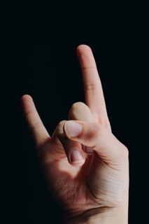 Rock sign Gesture hands with index and little finger up in form of horns