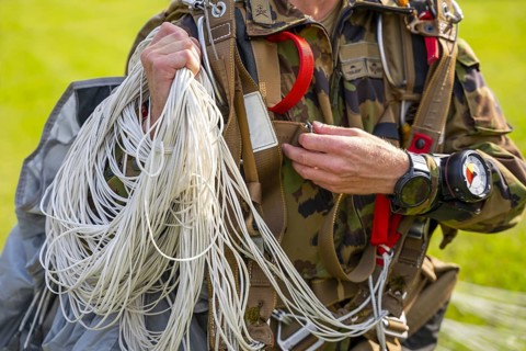 Military Parachuter Holding His Parachute in Switzerland